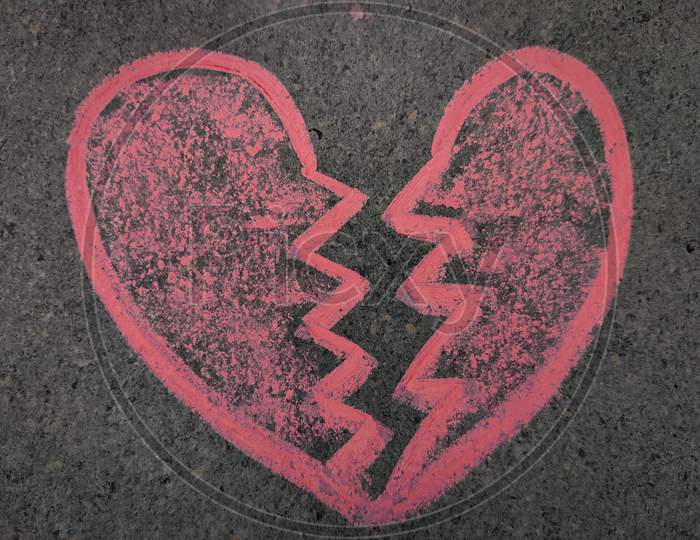 Hand Drawn Heart Breaking Symbol. Love Break Up Symbol. Using Color Chalk Pieces.