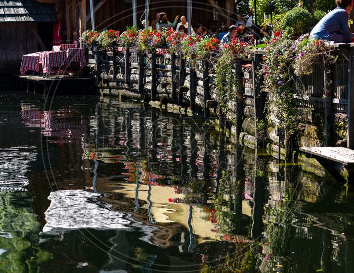 Reflections In Lake Hallstatt From An Adjacent Restaurant