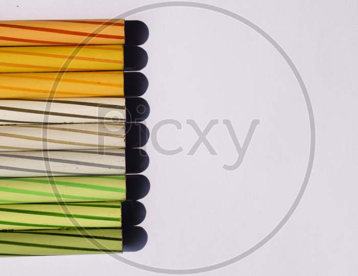 Color Pencils Arranged In Tricolor To Represent And Depict Indian Flag Colors On The Occasion Of Indian Republic Day Holiday Patriotic Symbolic. Creative Background Of Indian Flag To Wish Greetings