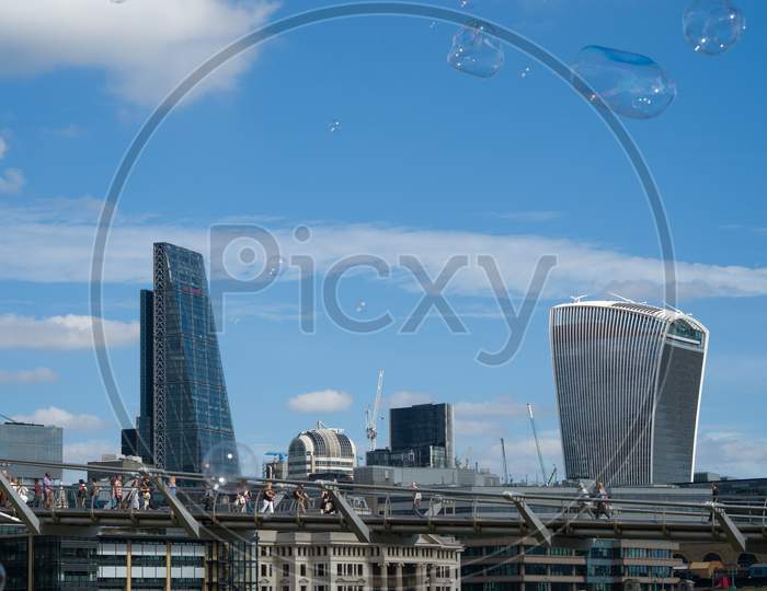 Bubbles Blowing Across The City Of London Skyline