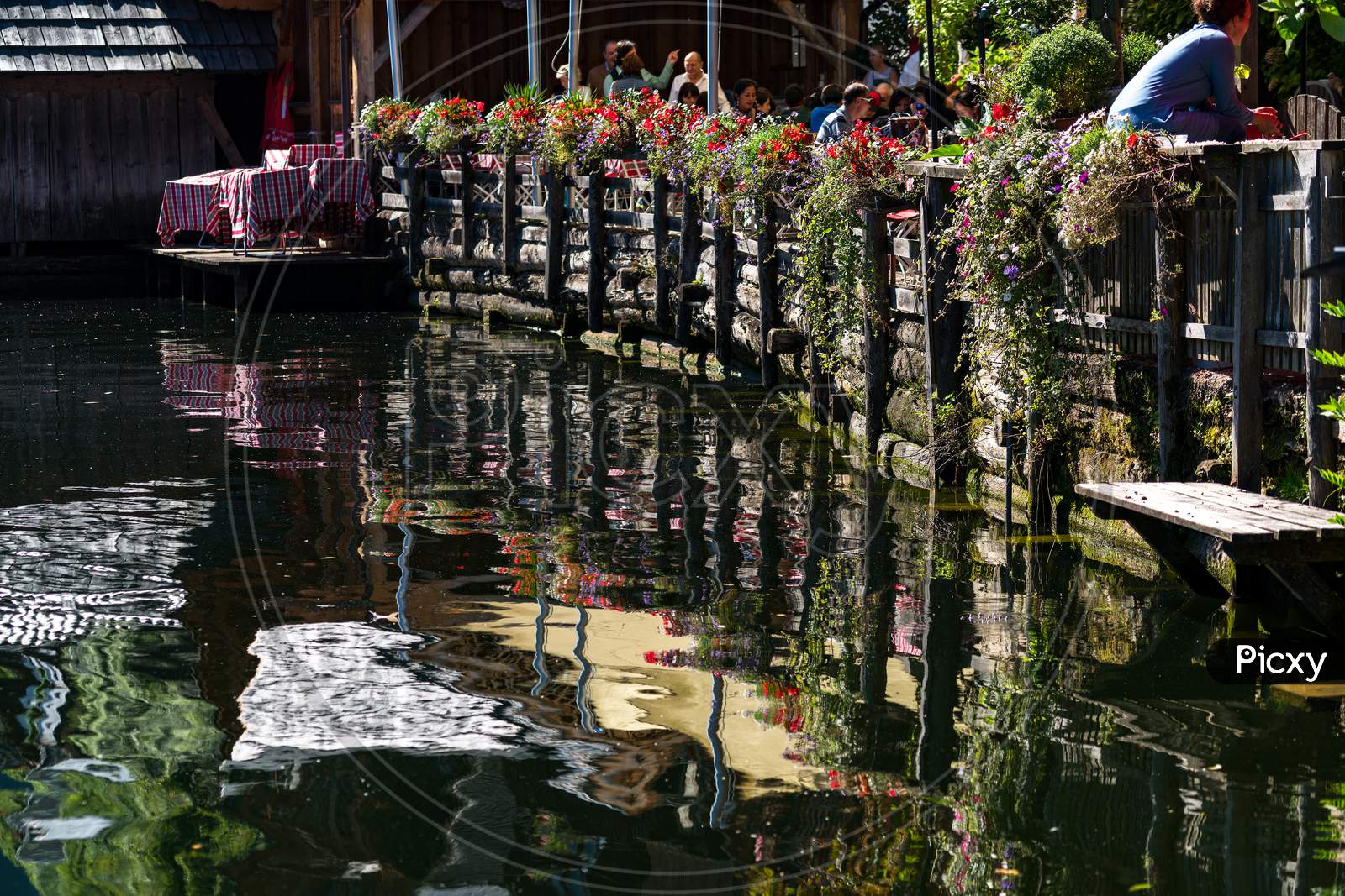 Reflections In Lake Hallstatt From An Adjacent Restaurant
