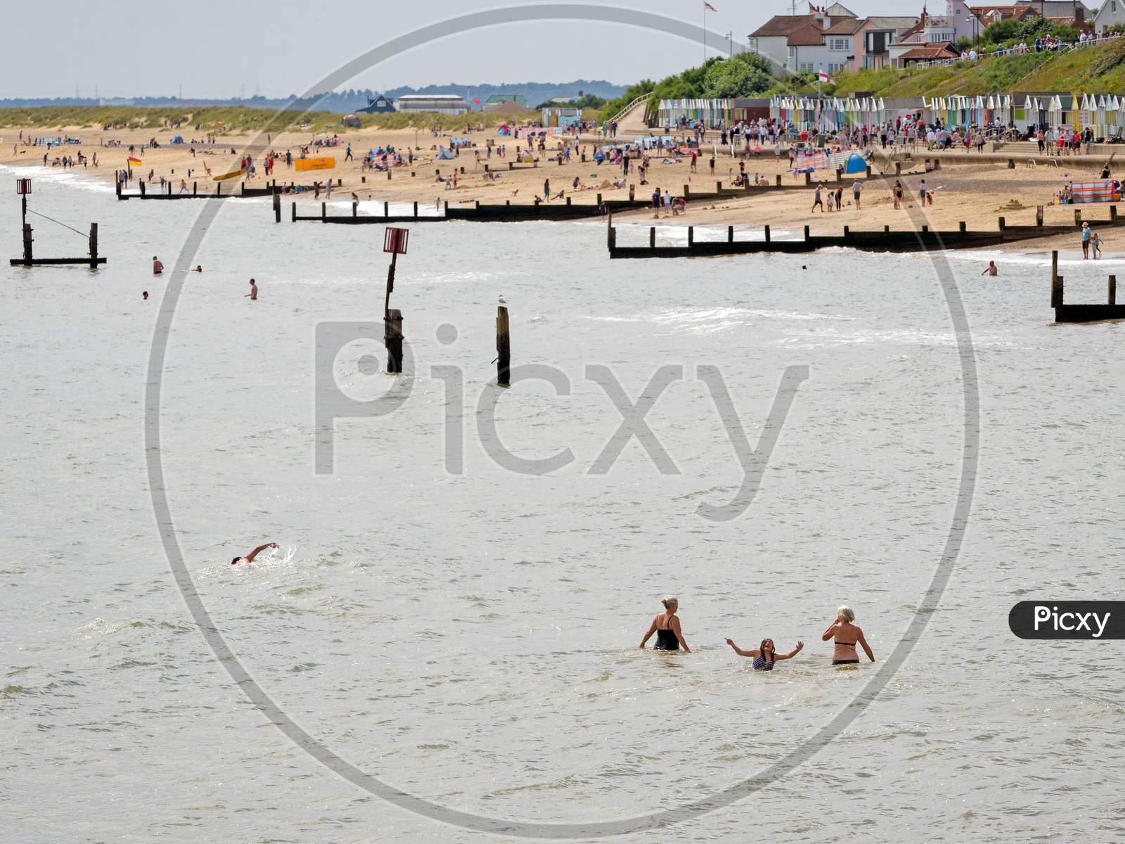 People Enjoying The Beach At Southwold