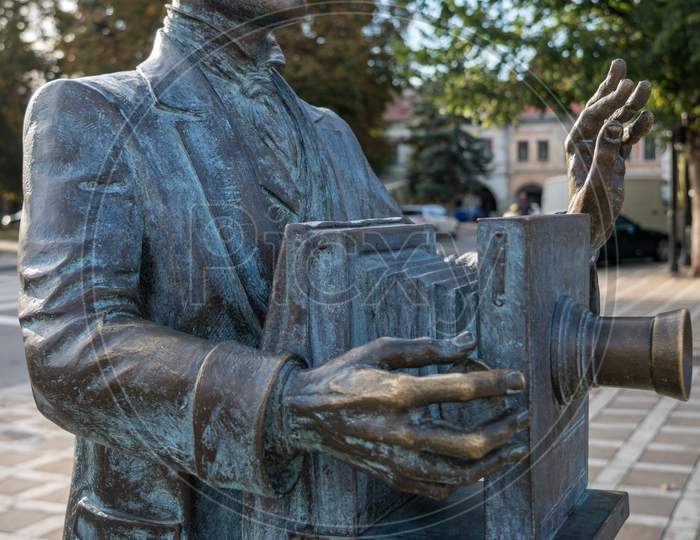 Bistrita, Transylvania/Romania - September 17 : Bronze Statue Of The Photographer Alexandru Rosu In Bistrita Transylvania Romania On September 17, 2018