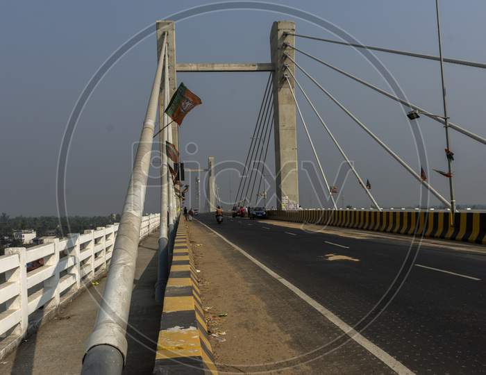 A Newly Made Bridge At Namkhana, West Bengal Over Matla River And Some Flags Of Bjp.