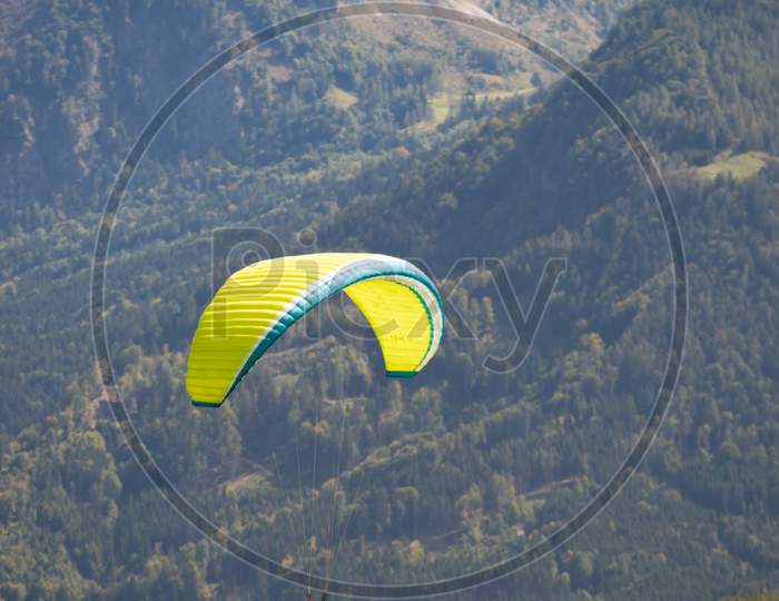 Hang-Gliding Above The Countryside Around Zwölferhorn Mountain
