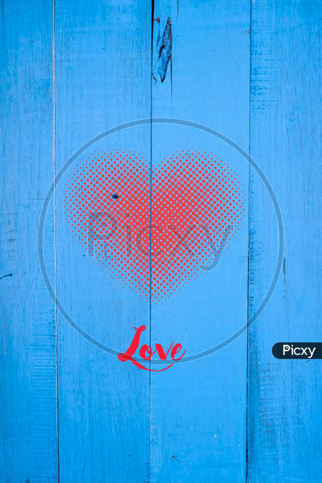 Love And Heart Stamp On Blue Wooden Background