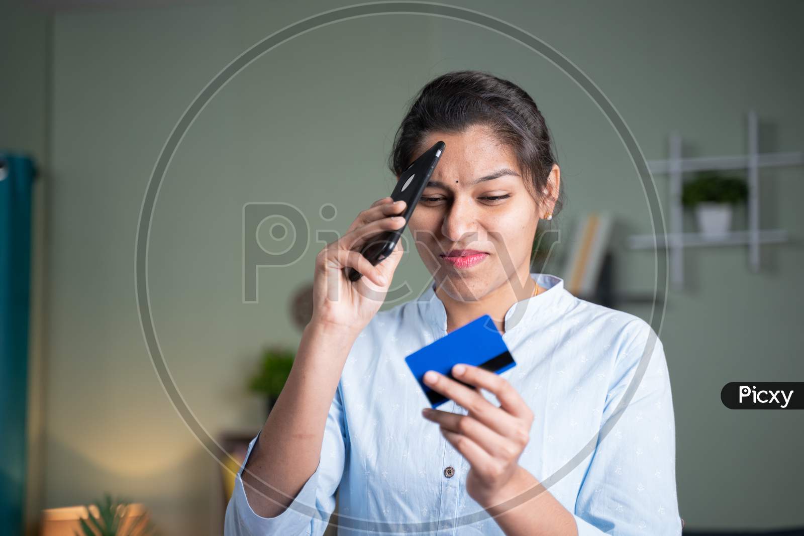 Young Business Woman Worried While Doing Online Payment Thorough Credit Card - Concept Unsuccessful, Failure Internet Payment Or Enter Wrong Password During Purchase.