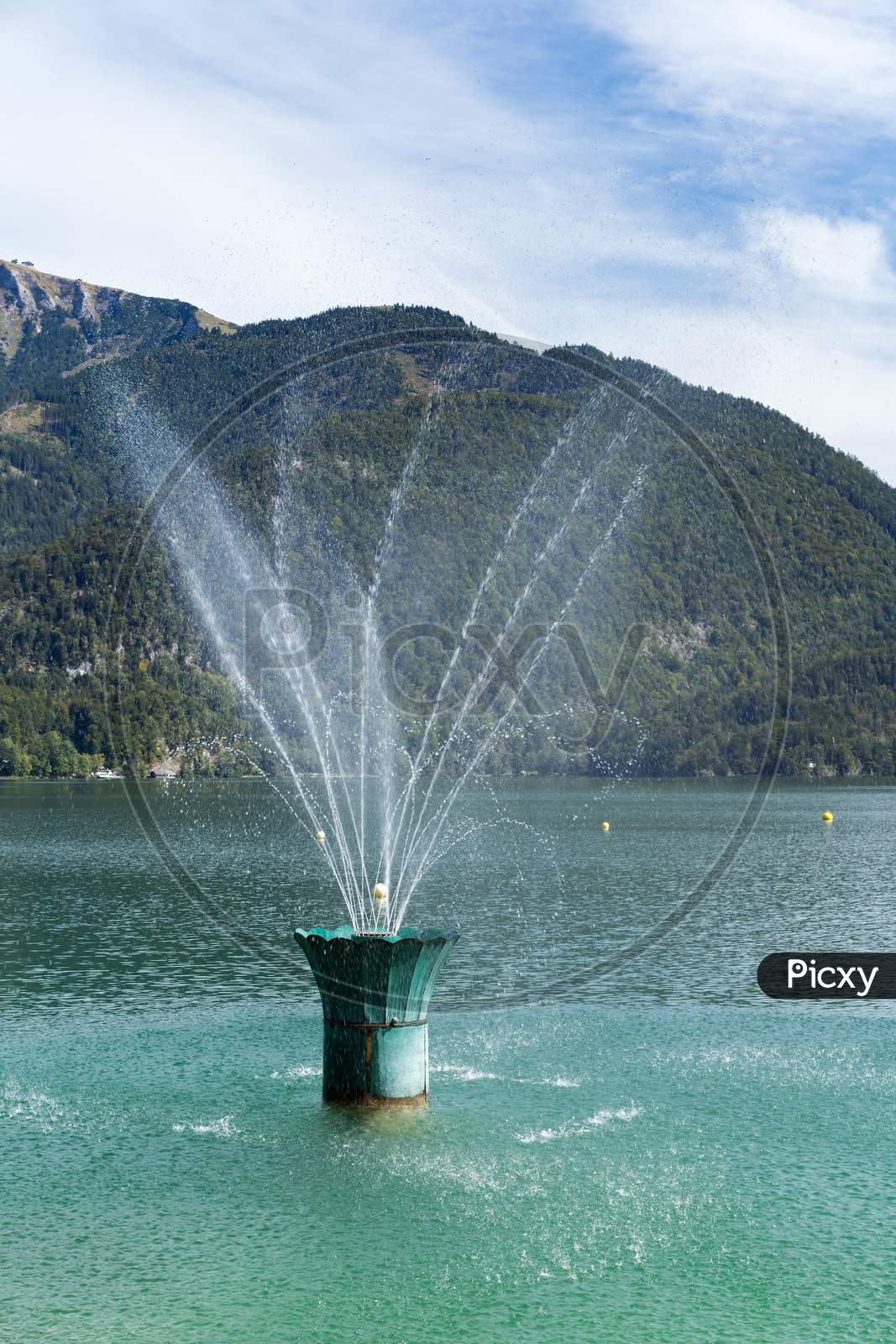 Fountain In Lake Wolfgang At St. Gilgen