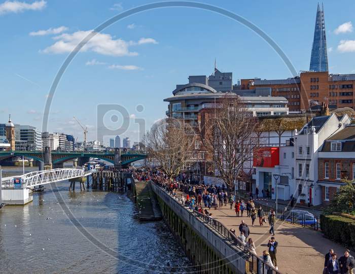 London/Uk - March 21 : View Along The South Bank Of The River Thames To The City Of London On March 21, 2018. Unidentified People.