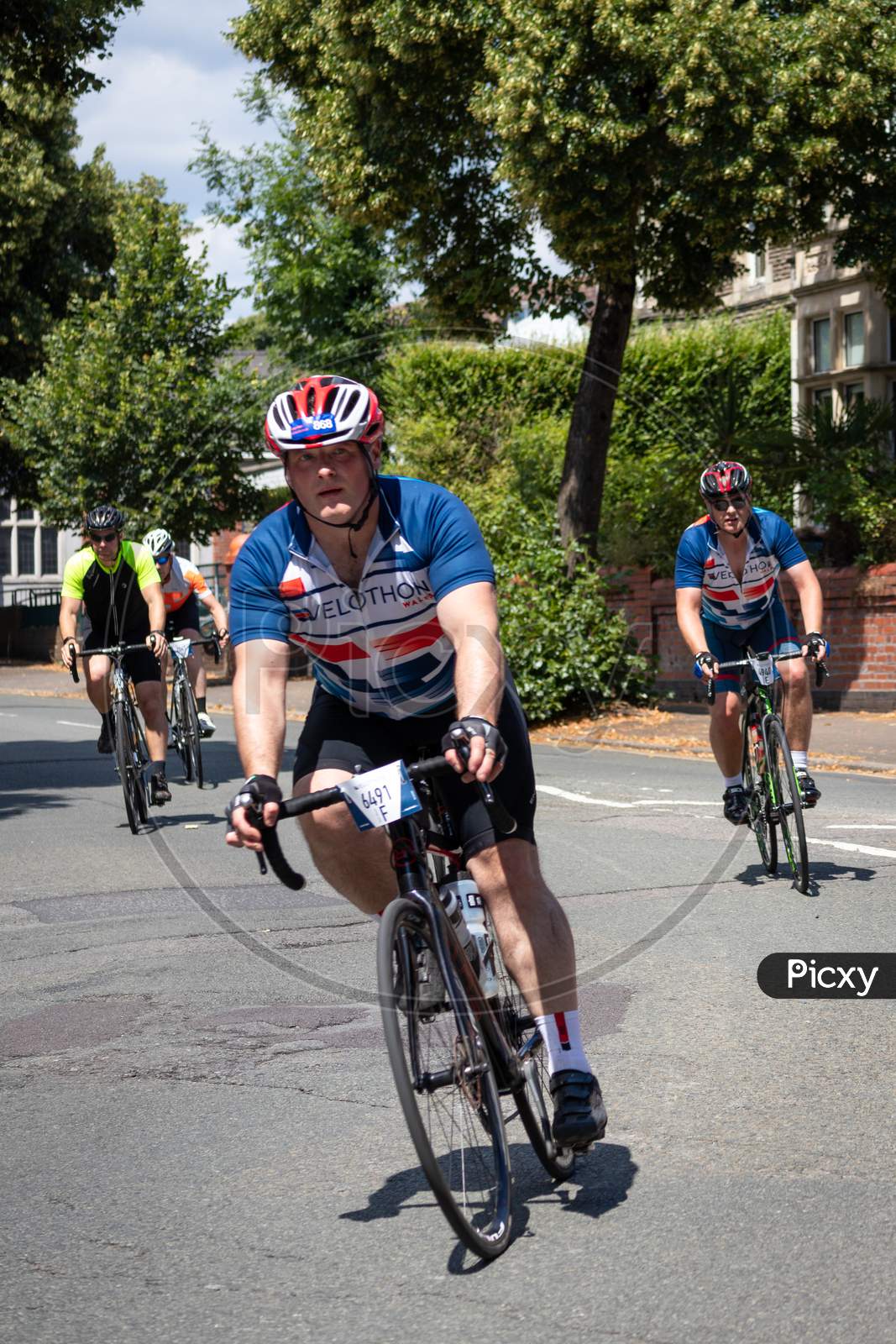 Cardiff, Wales/Uk - July 8 : Cyclists Participating In The Velothon Cycling Event In Cardiff Wales On July 8, 2018. Four Unidentified People