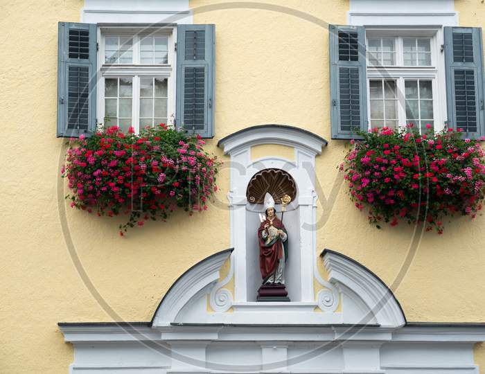 Statue Of A Bishop On A Wall In St Wolfgang