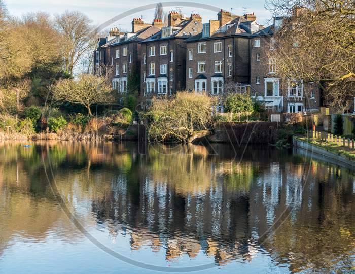 Row Of Houses By A Lake At Hampstead In London