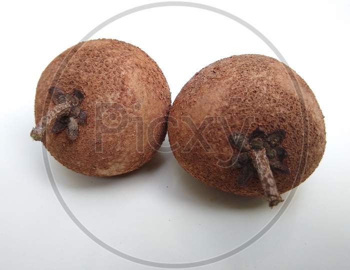Manilkara zapota (sapodilla ) or sapota fruits on white background