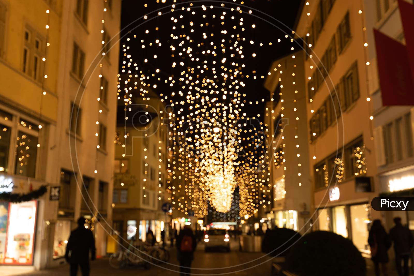 Image of Abstract Blurred Christmas Lights Called Lucy On Side Street