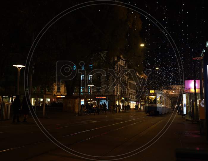 View To Train Main Station Of Zurich And Bahnhofstrasse At Christmastime In Time Of Corona Virus.
