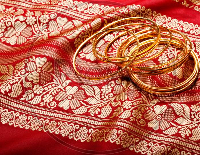 Indian Sari With Golden Bangles