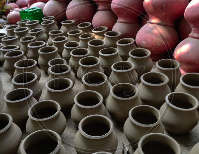 Indian Potter making clay products.