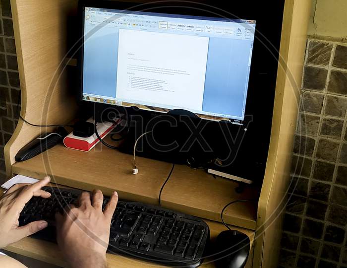 Men Hand Finger On Computer Keypad Typing Texts