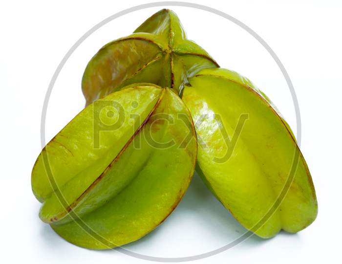 3 Green Carambola Fruit On A White Background