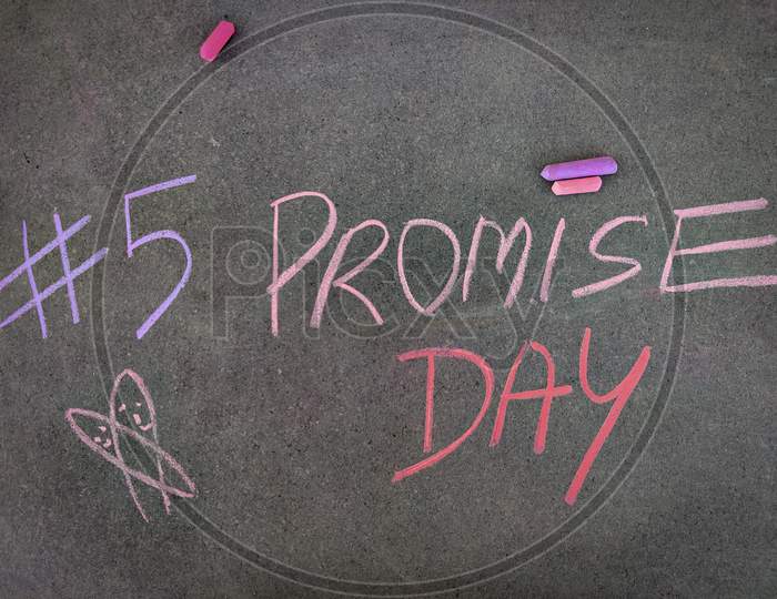 The Inscription Text On The Grey Board, #5 Promise Day With Hand Drawn Symbol . Using Color Chalk Pieces. Valentines Week