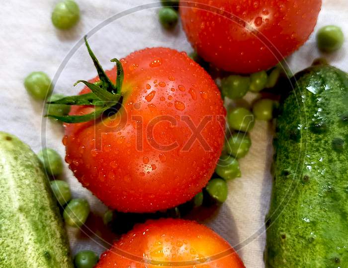 red tomatoes peas cocumber
