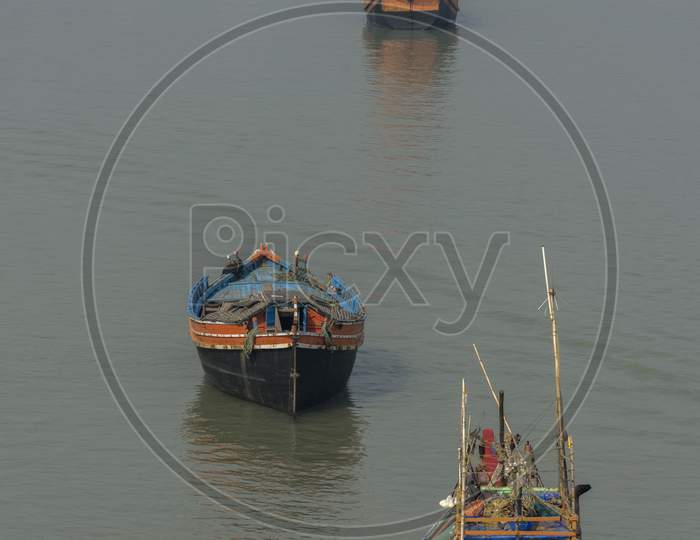 A Fishing Boat Floating On River Matla At Namkhana, West Bengal.
