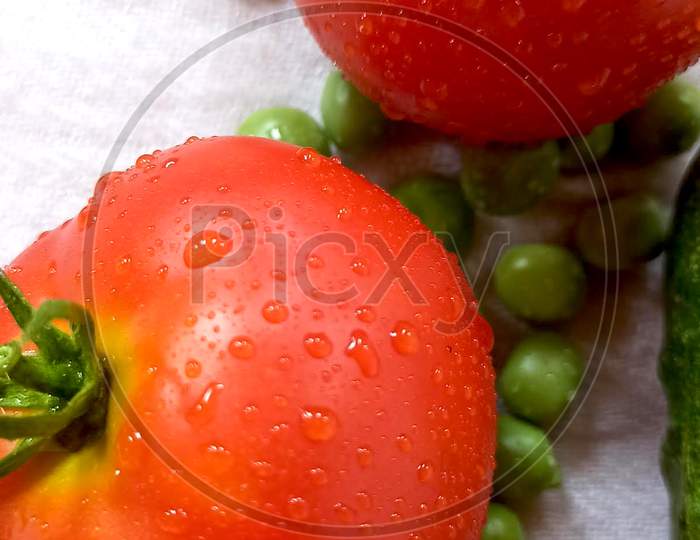red tomatoes peas cocumber
