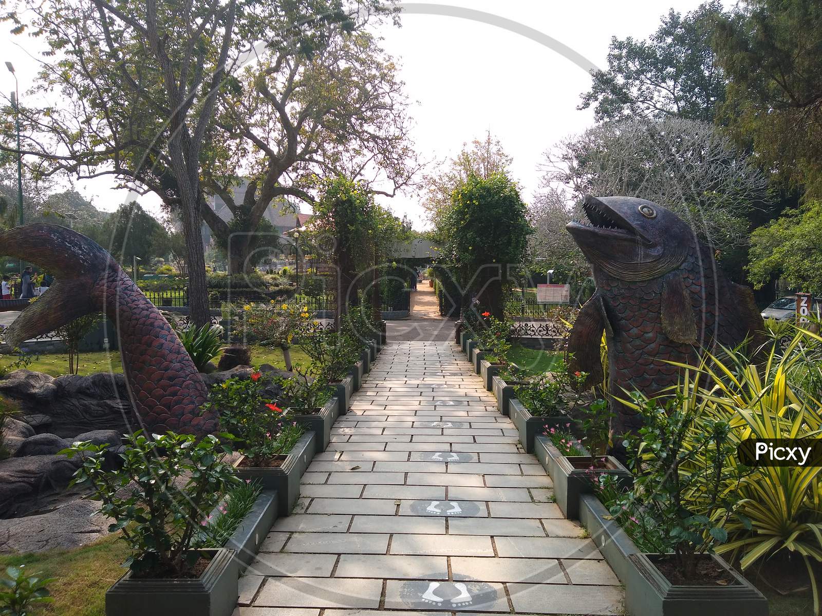 Beautiful fish sculpture and stone paved pathway situated at Thiruvananthapuram aquarium