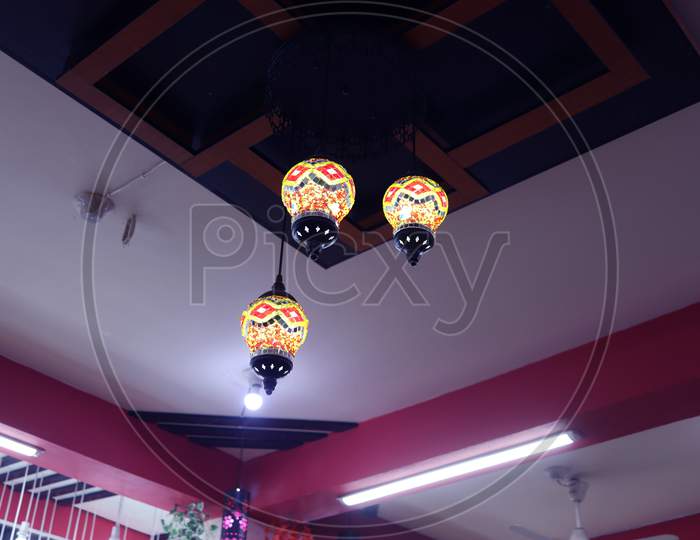 Mosaic Lamps Hanging On The Hotel Roof In Bangladesh. Vintage Light, Arabic Chandelier, Colorful Cultural Lamps, Colorful Lantern Lamps.