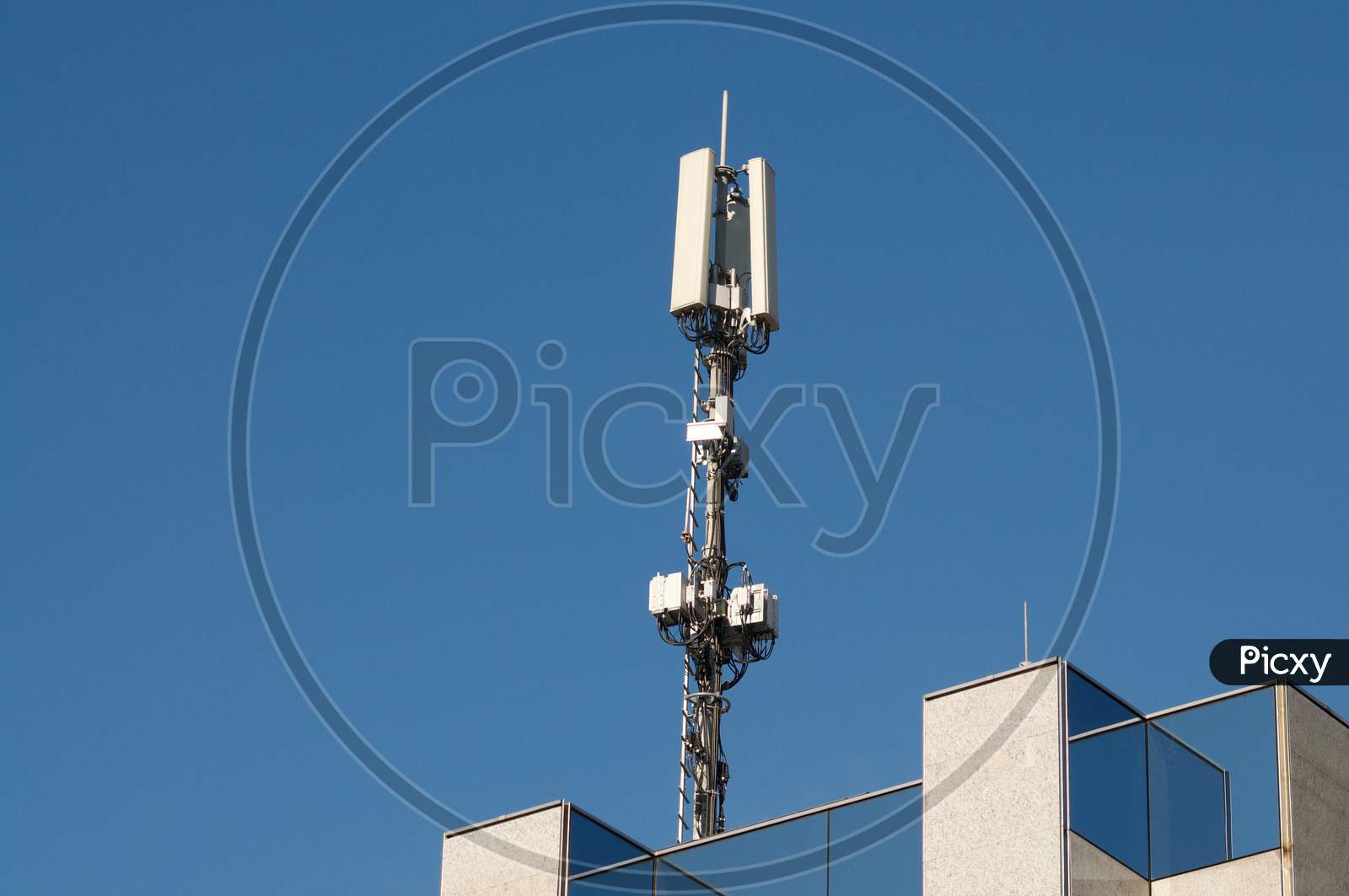 Telecommunication Antenna Of 4G And 5G Network On A Building In Switzerland