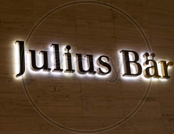 Luminous Julius Baer Bank Sign Hanging In Lugano, Switzerland