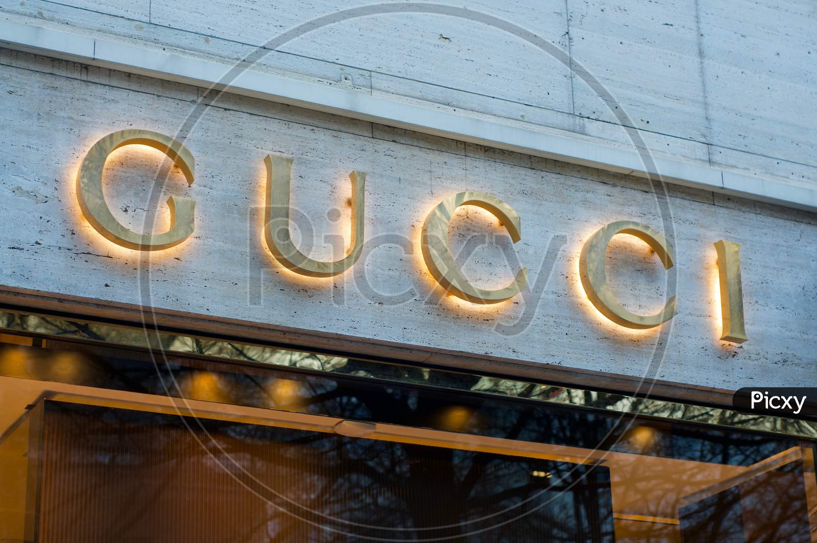 Luminous Gucci Store Sign Hanging In Lugano, Switzerland