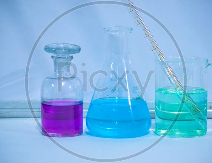 Color Solution In Reagent Bottle, Chemistry Laboratory Image