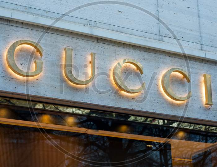 Luminous Gucci Store Sign Hanging In Lugano, Switzerland