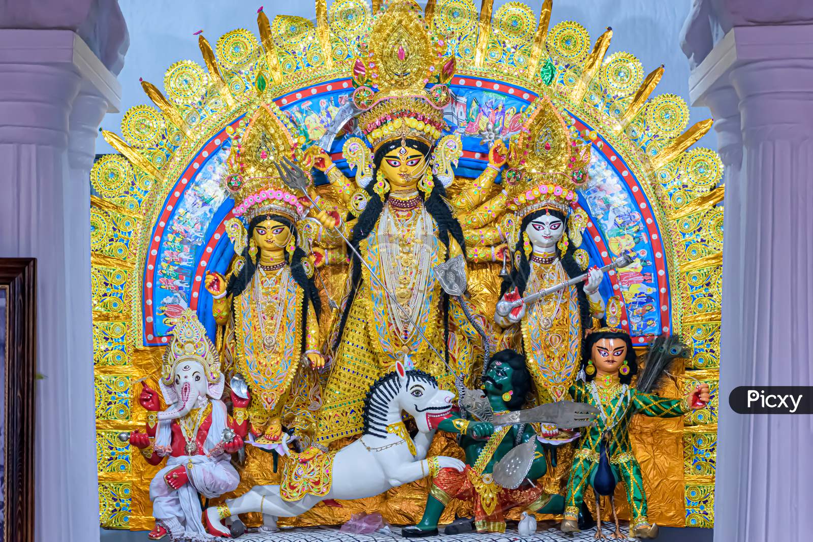 Goddess Durga Idol At Decorated Durga At Sovabazar Rajbari In Kolkata, West Bengal, India. Durga Puja Is Biggest Religious Festival Of Hinduism And Is Now Celebrated Worldwide.