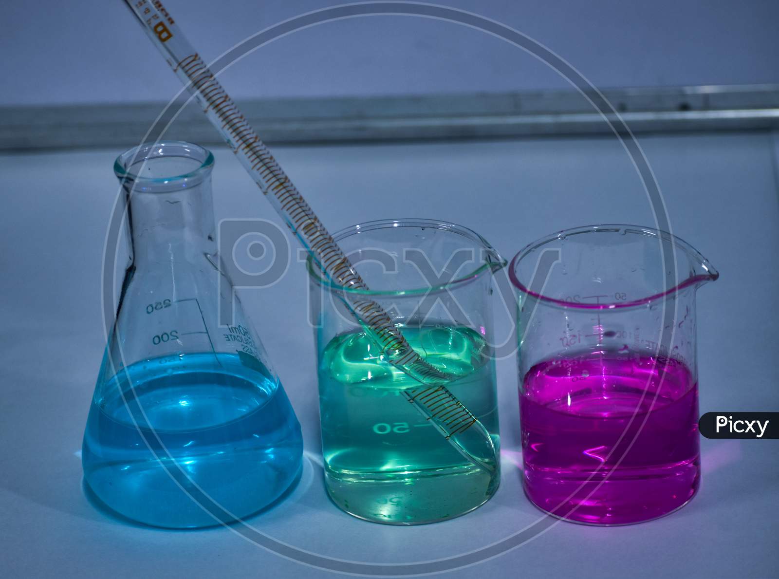 Chemistry Lab Apparatus With Color Solution, Beaker, Conical Flask
