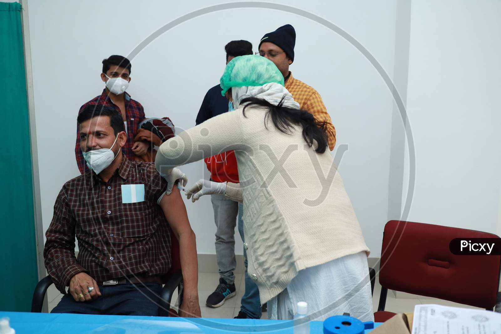 January 16 2021, Kishanganj, Bihar, India. A Doctor Wearing A Mask Undergoing Covishield Vaccination Against Covid 19 At Mgm Medical College, Kishaganj, Bihar