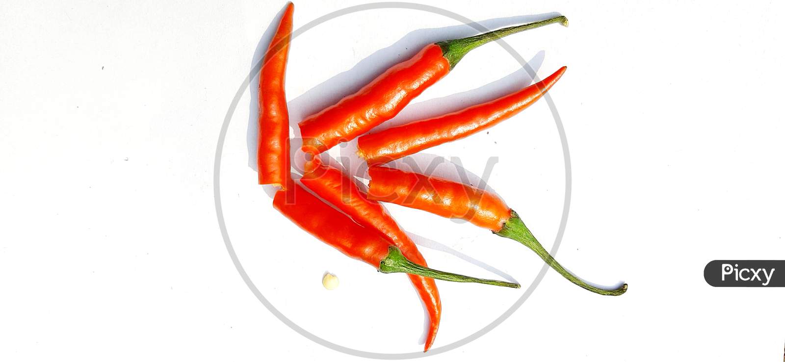 Red Chilis White Papper Background