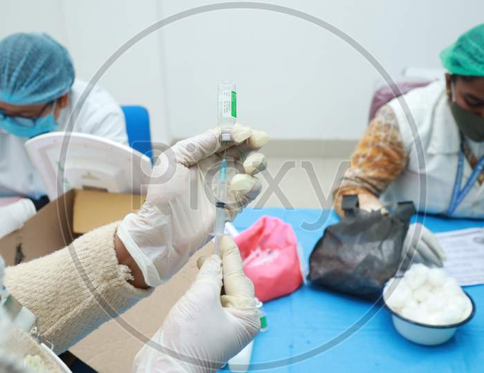 January 16 2021, Kishanganj, Bihar, India. A Nursing Staff Drawing Covishield Vaccine In A Syringe Preparing For Vaccination Against Covid 19 At Mgm Medical College, Kishaganj, Bihar