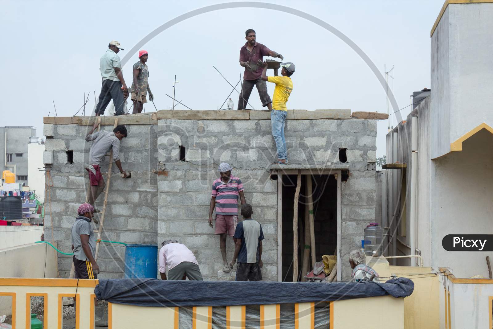 Image of A Civil concrete roofing work in progress during midday on a