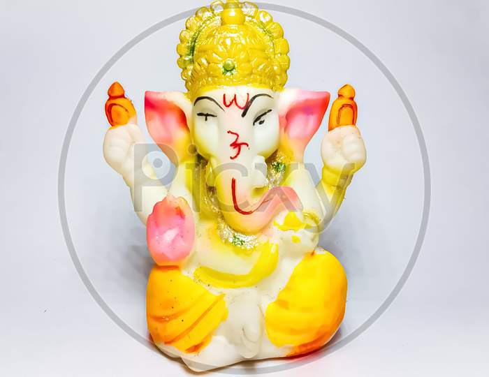 Idol of Lord Ganesh with white background