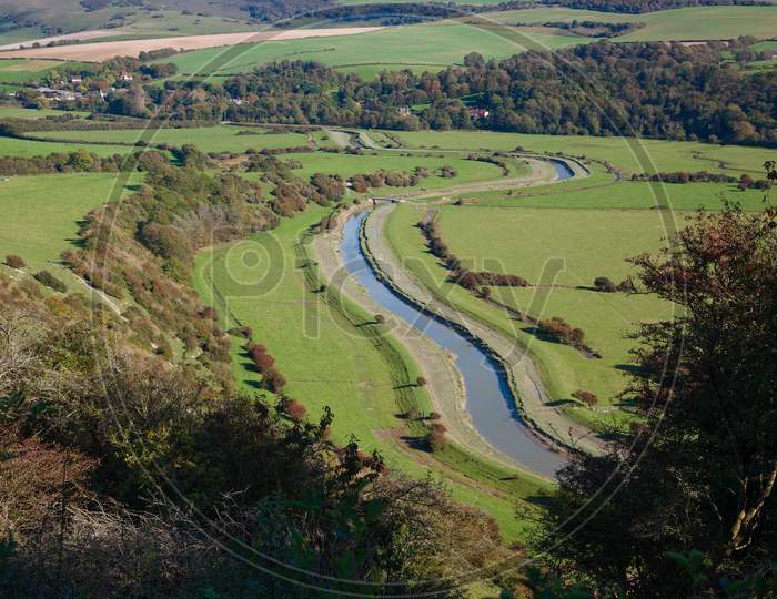 The River Cuckmere Flows Through The Sussex Countryside