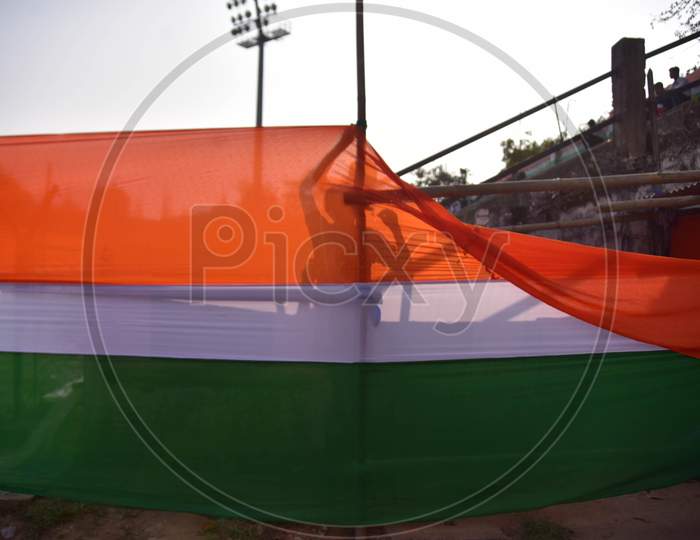 workers decorate the venue of the parade ground in colors of the national flag ahead of India’s Republic Day celebrations at Nurul Amin Stadium in Nagaon District of Assam on Jan 24,2021