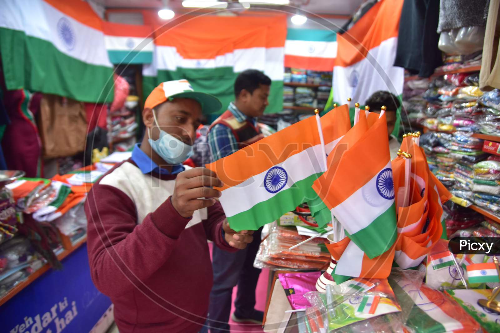 A Vendor selling Indian flag on the eve of Republic day celebration at a shop in Nagaon District of Assam on Jan 24,2021.