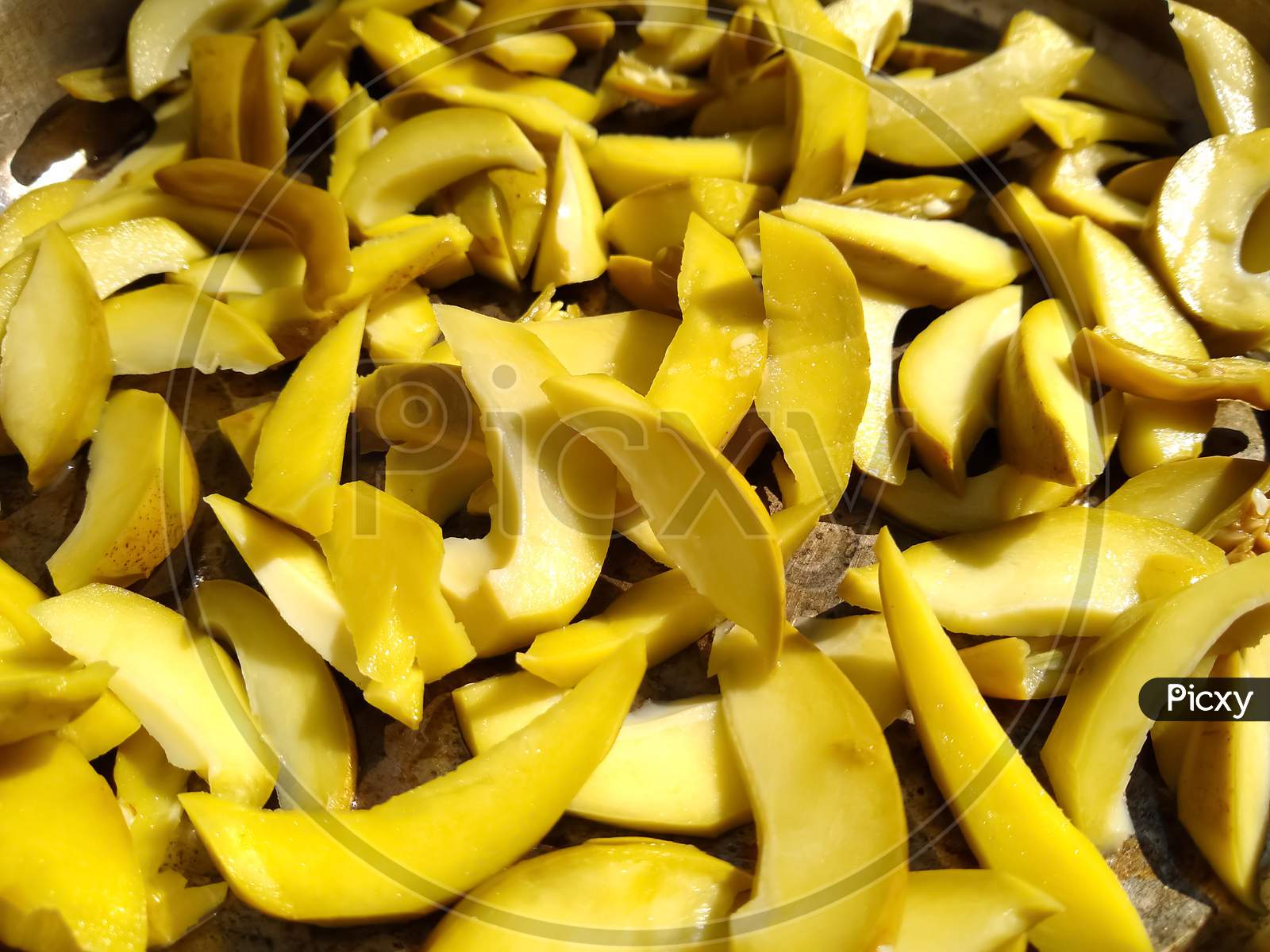 Sliced mango for pickle, spicy and salty food
