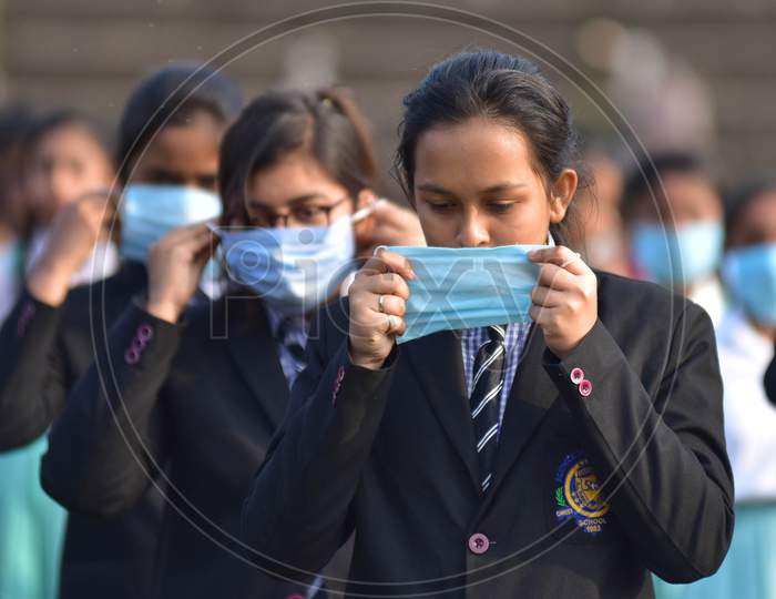 :A students wearing mask during the full dress rehearsals for the Republic Day parade in Nagaon District of Assam on Jan 24,2021.