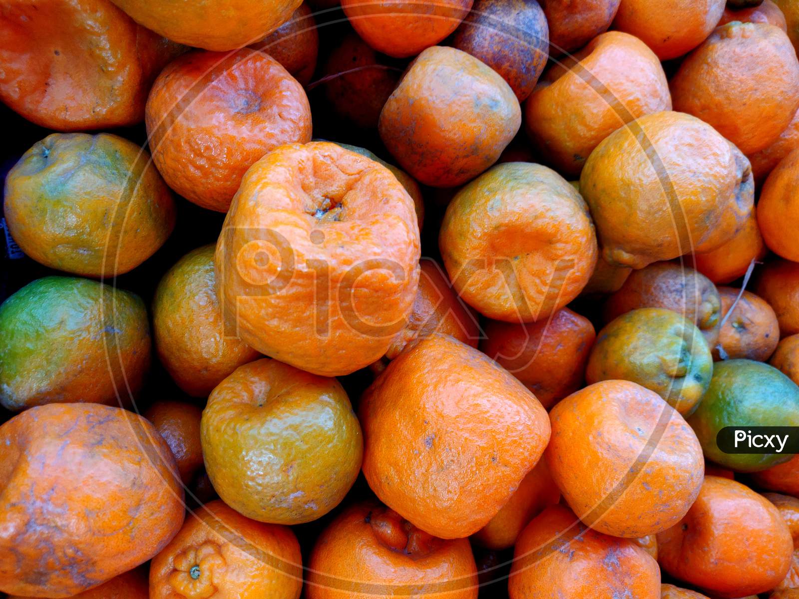 A Basket Full Of Orange That Is The Fruit Of Various Citrus Species In The Family Rutaceae; It Primarily Refers To Citrus × Sinensis, Which Is Also Called Sweet Orange.