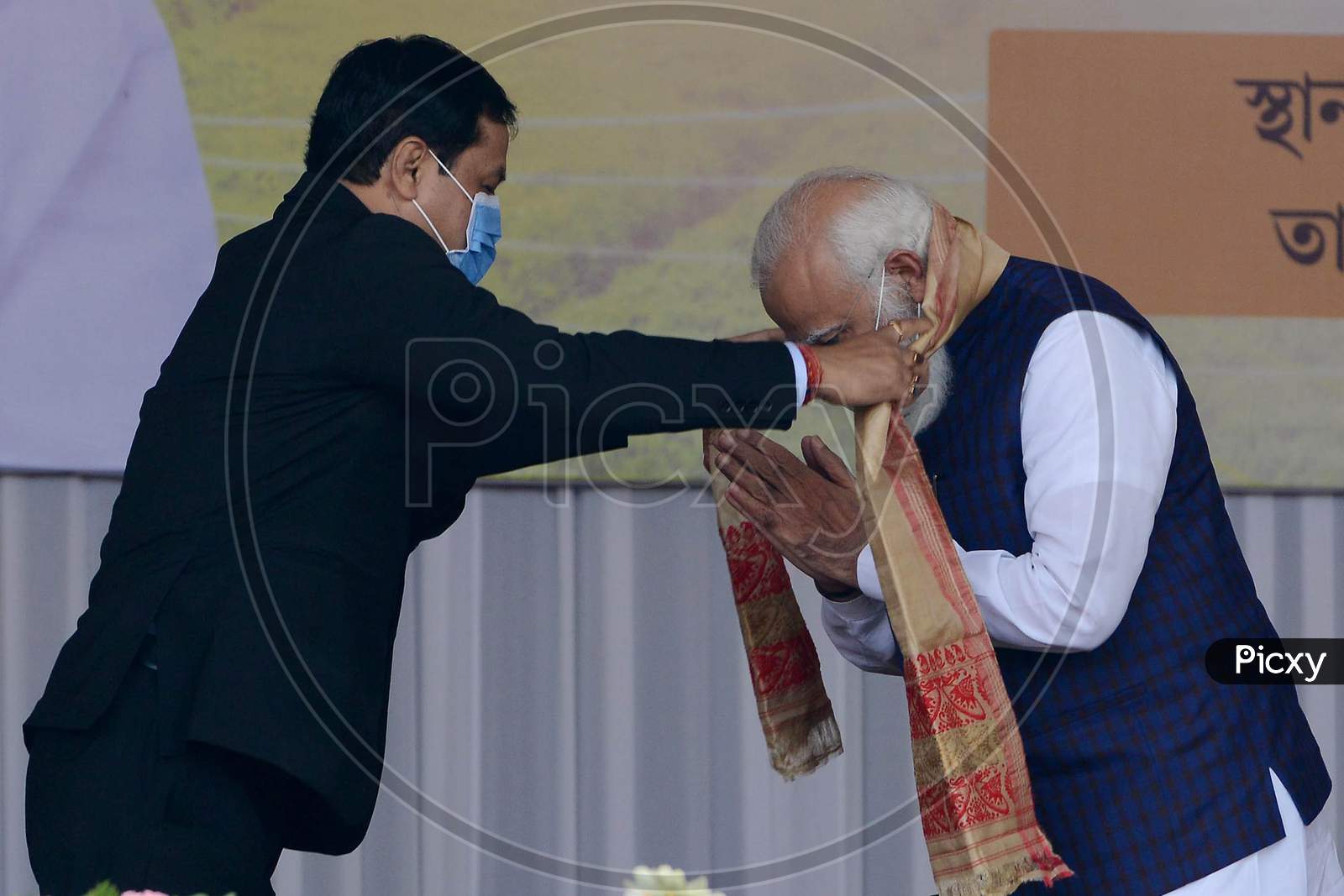 Indian  Prime Minister Narendra Modi  felicitated by Assam CM Sarabananda Sonowalduring a public meeting, at Jerenga Pathar in Sivasagar  District of Assam on Jan 23,3021