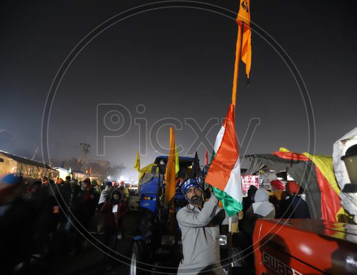 Farmers gearing up for Republic Day tractor rally as a part of the ongoing agitation against new farm laws at Singhu Border, near New Delhi, India on January 25, 2021.