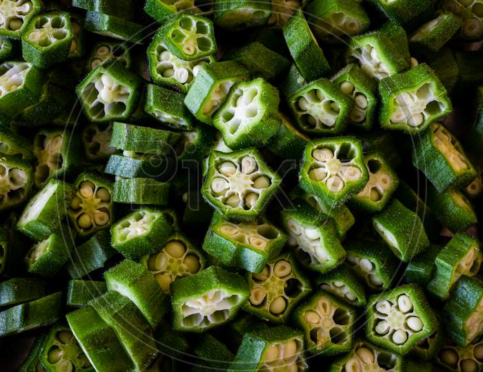 Top View Of The Cut Okra Vegetable (Also Called As Ladies Finger) Ready For Cooking